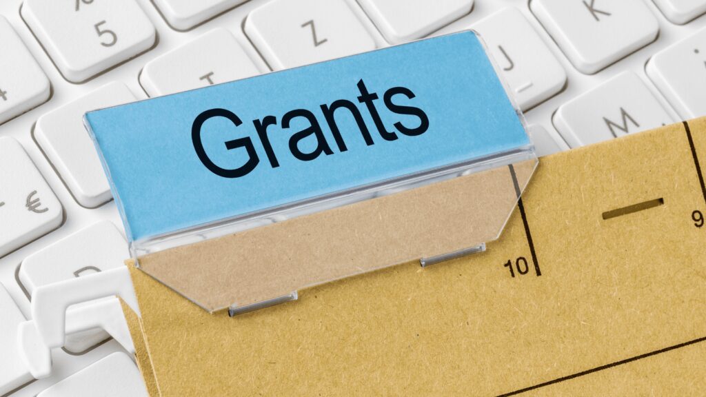 Grants written on a file folder