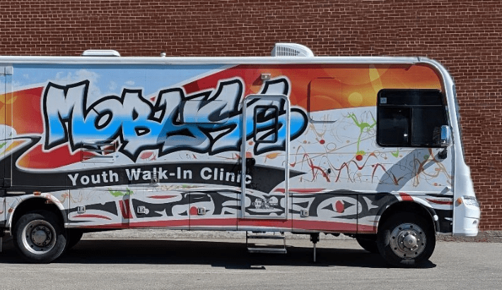Photo of MOBYSS RV Bus with graffiti